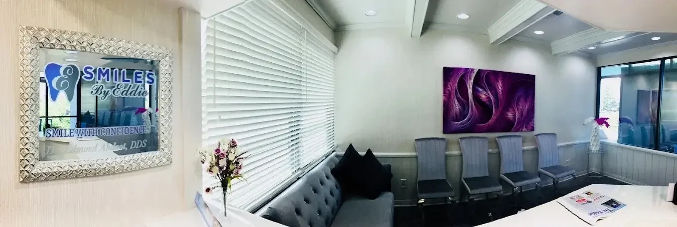 Panoramic view of the Smiles by Eddie waiting area with purple artwork